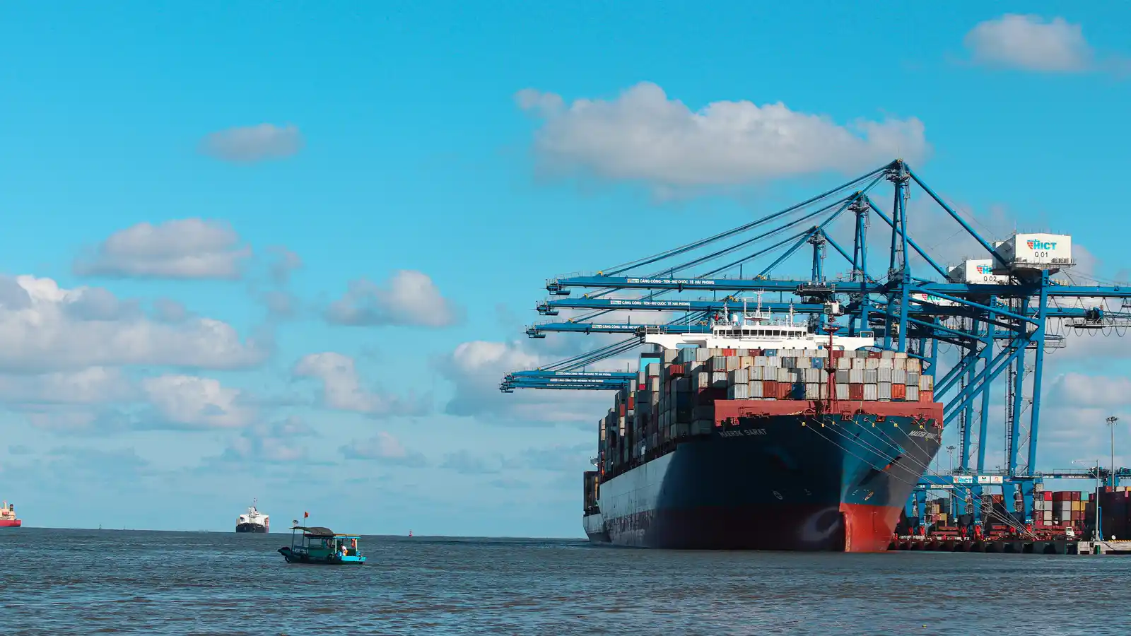 Stacked shipping containers at a port terminal