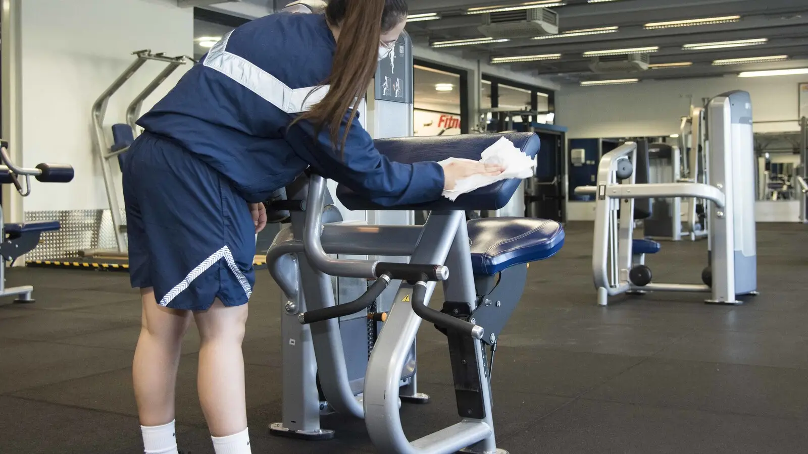 Row of cardio machines in a commercial fitness centre