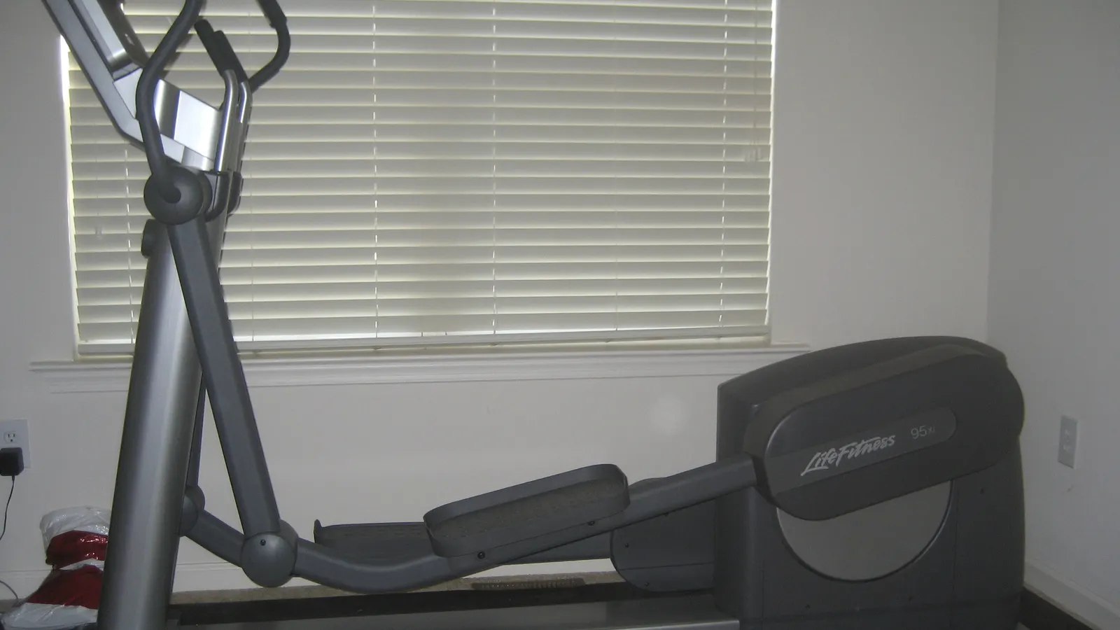 Elliptical trainer in a fitness facility
